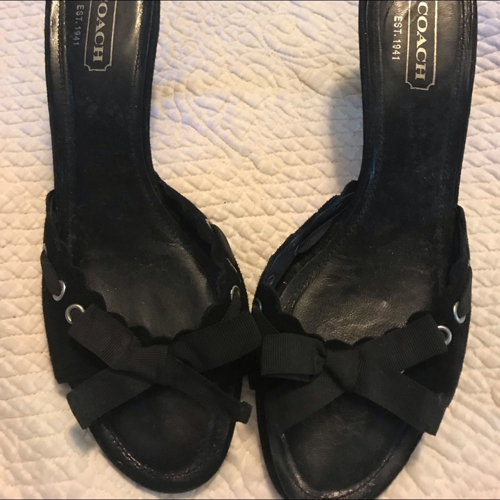 Black pair if Coach slip on pumps with bows.